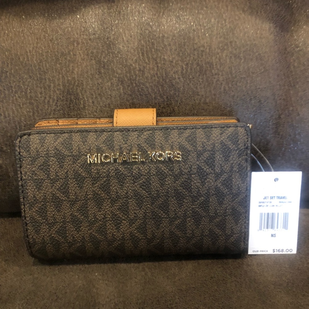 Brand New!!! MK brown & tan jet set travel wallet